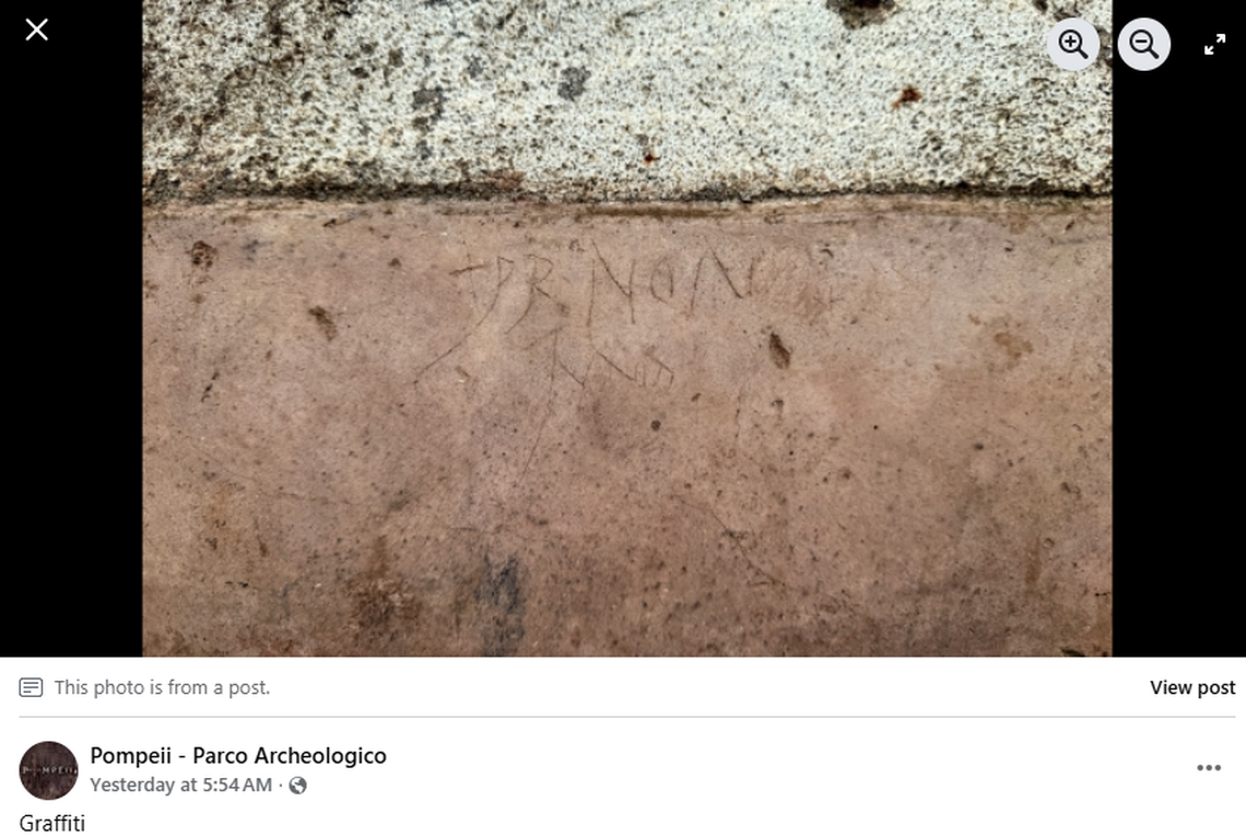 Graffiti marks were left behind on the bench, likely by those killing time while they waited for the head of the Roman house.