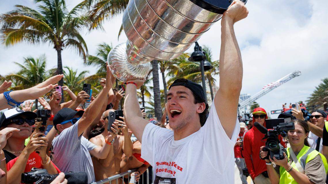 Florida Panthers right wing Mackie Samoskevich (25) hoists the cup over his head during the Florida Panthers Stanley Cup Championship victory parade on Sunday, June 22, 2025 down Las Olas in Fort Lauderdale, Fla.
