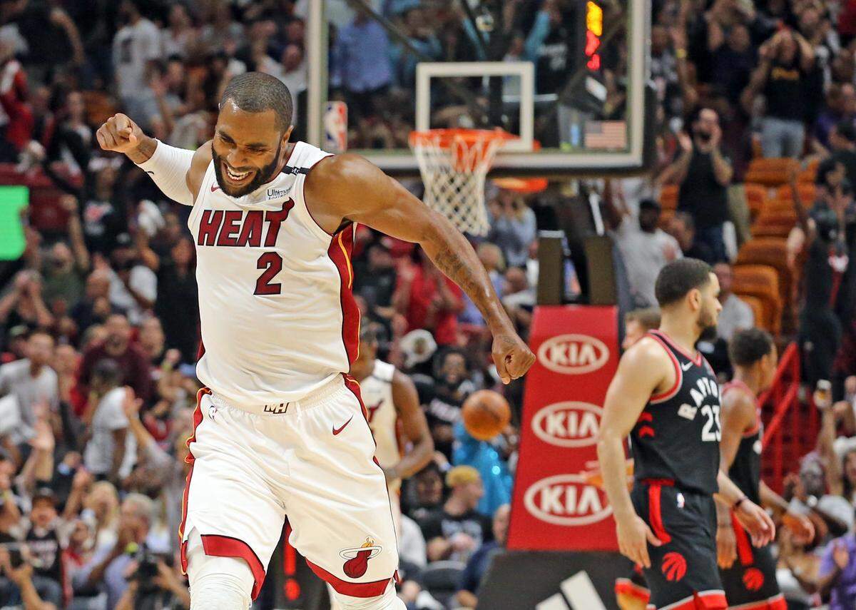 Miami Heat Wayne Ellington (2) celebrates after one of his three-pointers in regular time at the end of the fourth quarter as they play the Toronto Raptors at the AmericanAirlines Arena in Miami, Florida, April 11, 2018.