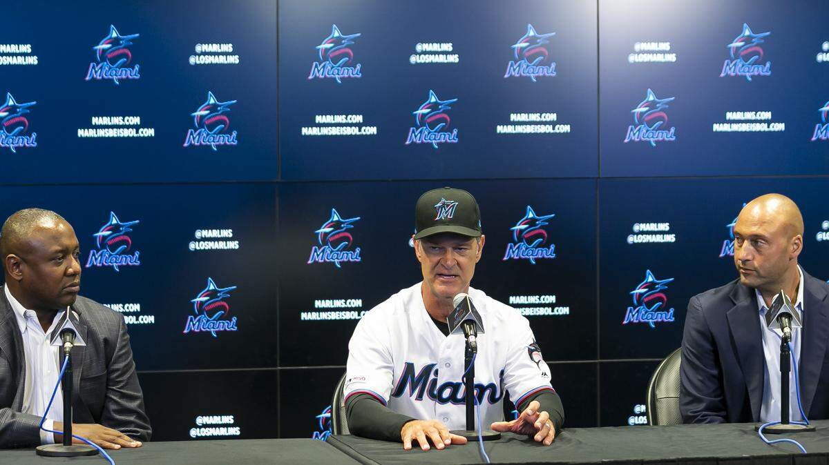 From left to right: Michael Hill, president of baseball operations for the Miami Marlins, Don Mattingly, team manager, and Derek Jeter, chief executive officer, speak during a press conference at Marlins Park on Sept. 20. The Marlins would like to add at least one veteran bat this winter.