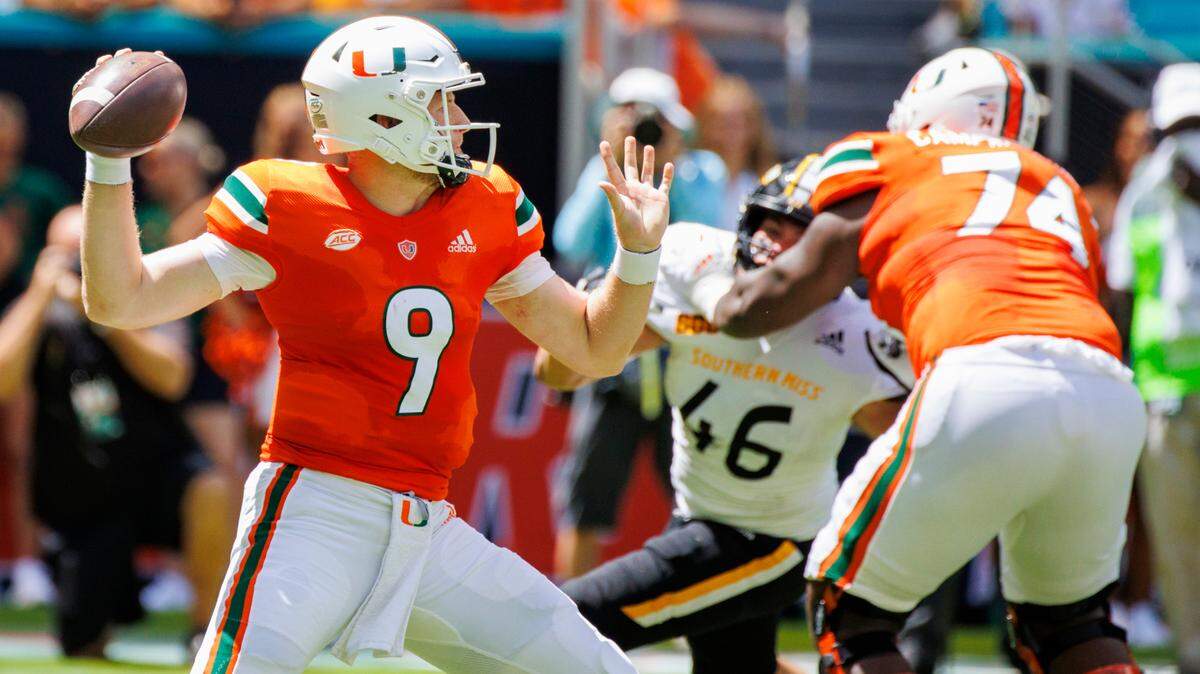 Miami Hurricanes offensive lineman John Campbell Jr. (74) blocks Southern Miss Golden Eagles linebacker Averie Habas (46) as Hurricanes quarterback Tyler Van Dyke (9) sets up to pass during the first quarter of an NCAA non conference game at Hard Rock Stadium on Saturday, September 10, 2022 in Miami Gardens, Florida.