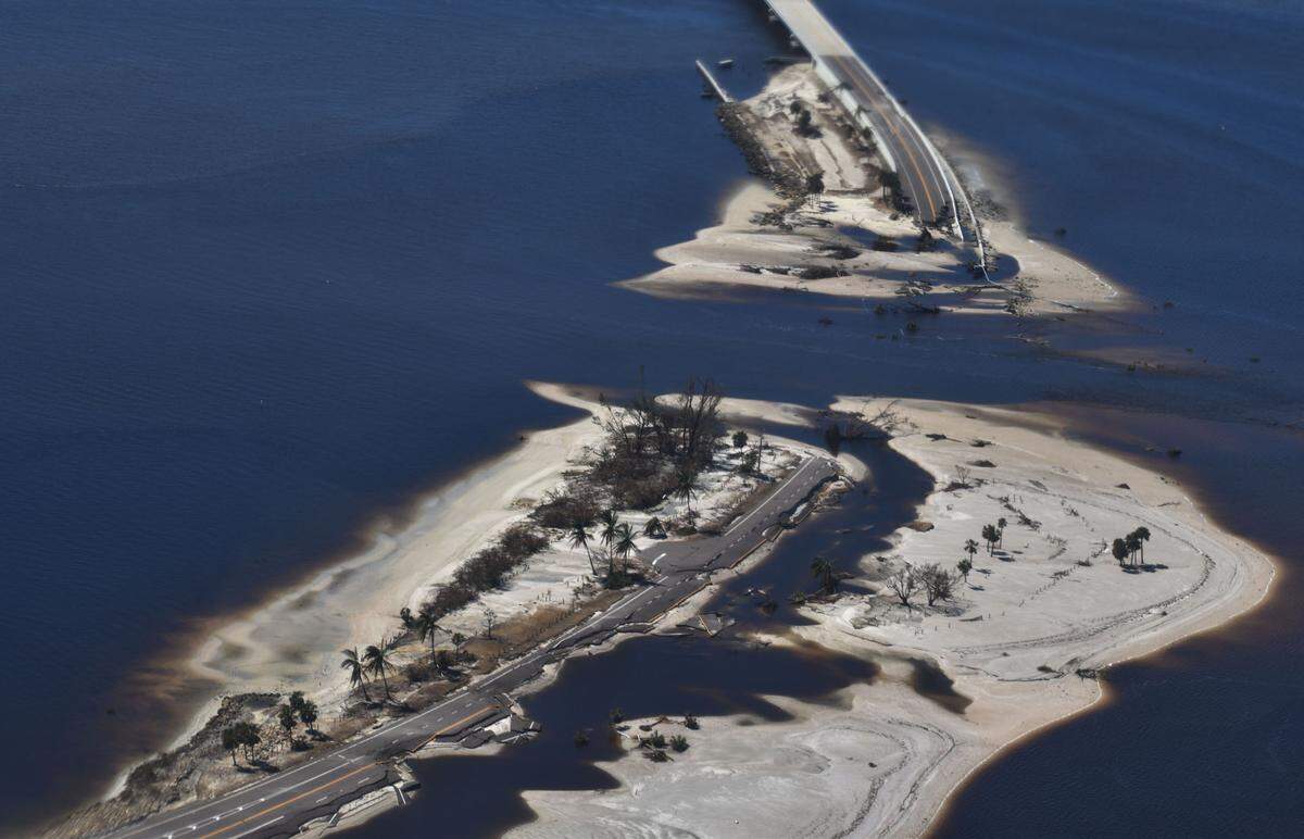Part of the collapsed Sanibel Causeway from an aerial view during a Coast Guard flight on Oct. 2, 2022 after Hurricane Ian.