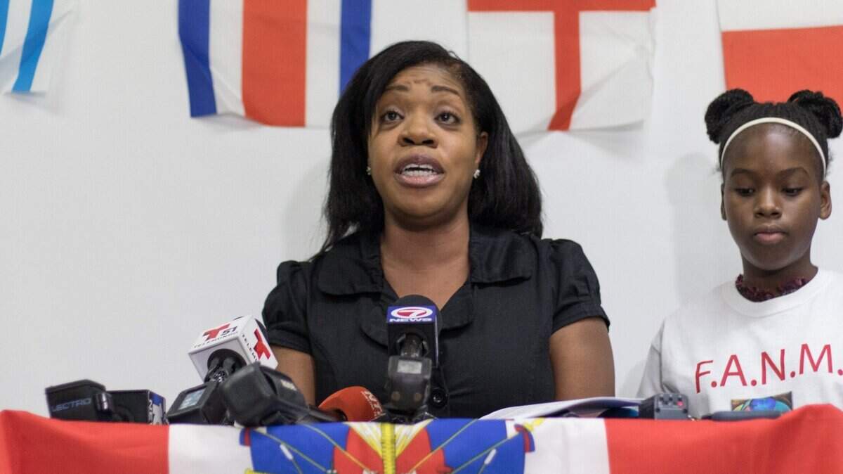 Shirlee Moreau Lafleur, representing U.S. Congresswoman Frederica Wilson, D-Miami, urges President Trump to find a permanent solution for TPS recipients during a press conference at Family Action Network Movement (FAMN) in Miami on July 24, 2018.