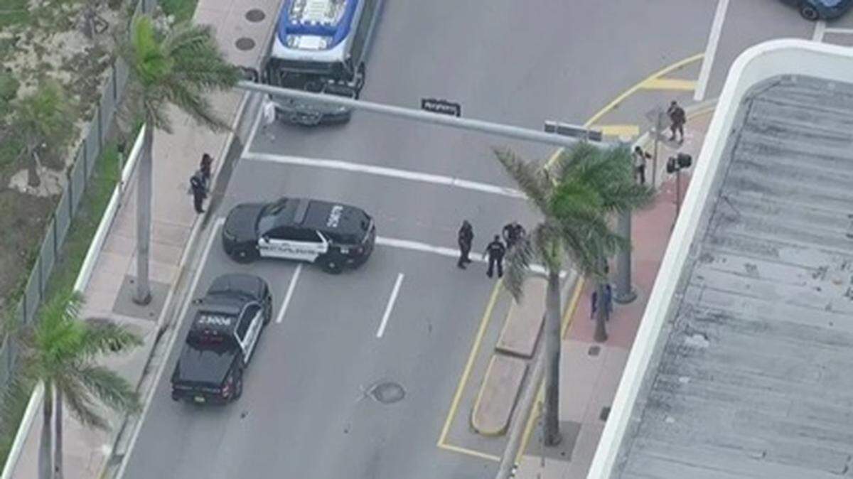 Police block Collins Avenue near 67th Street in Miami Beach on Friday morning, June 5, 2026, after a shooting.