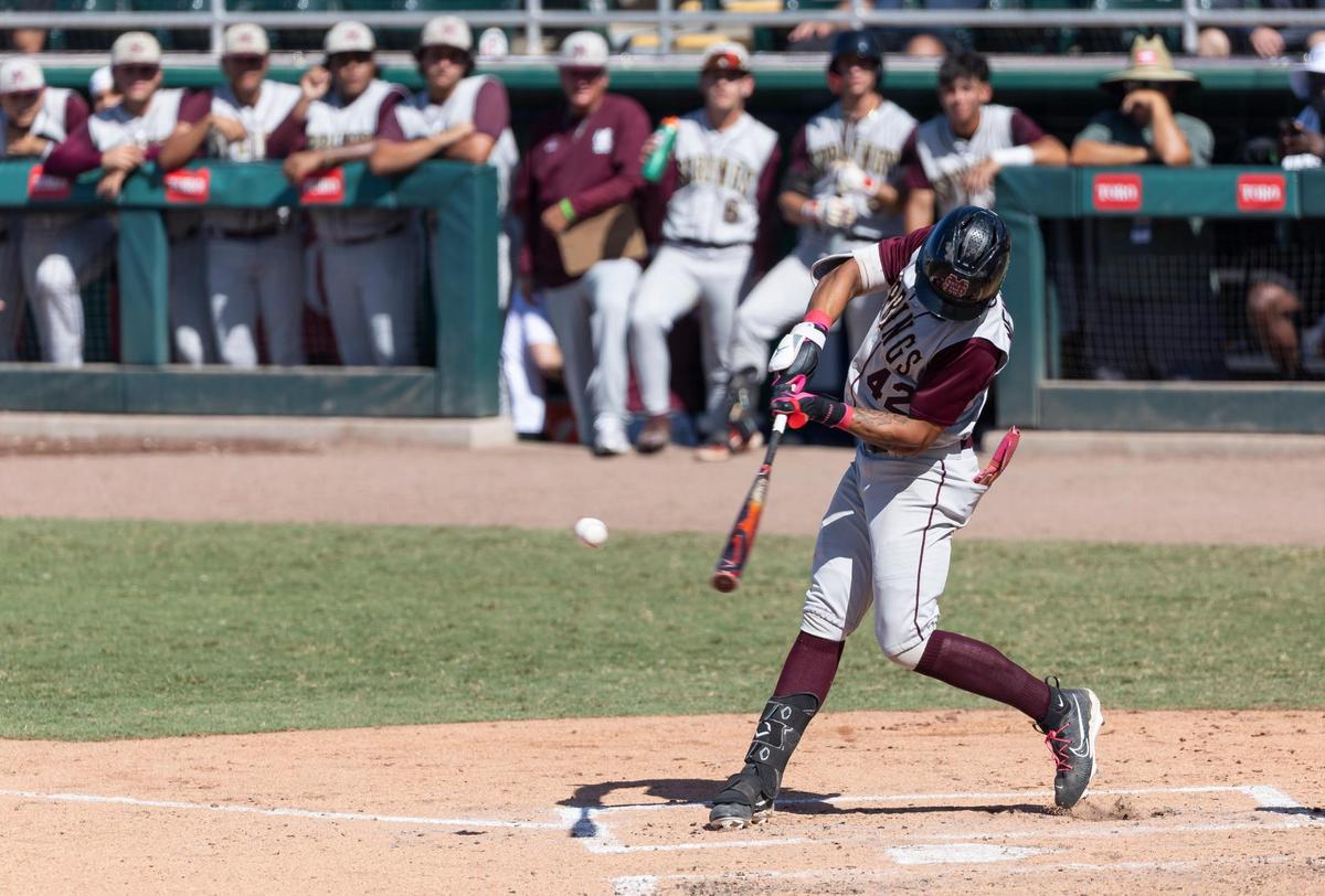 Miami Springs Golden Hawks outfielder Justin Mercado (42) hits a triple against the South Walton Seahawks in the third inning of their Class 3A state baseball championship game at Hammond Stadium on Tuesday, May 20, 2025, in Fort Myers, Fla.