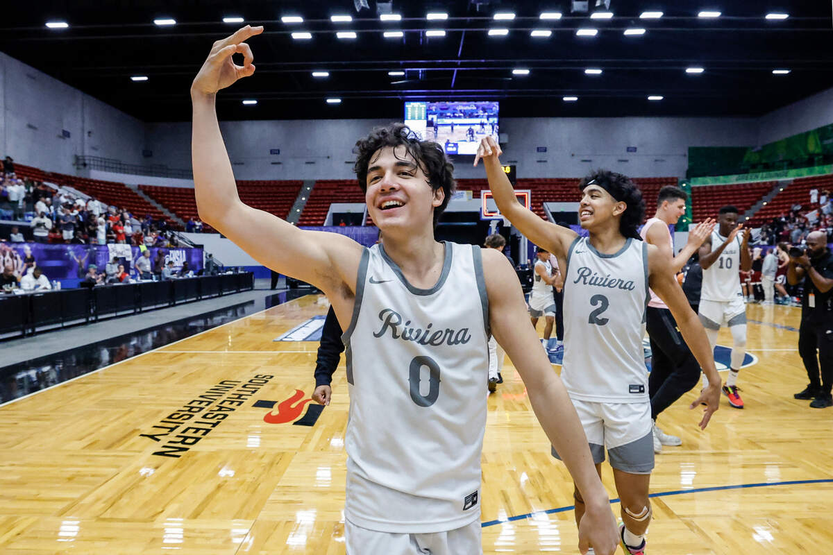 Riviera Prep’s Myles Fuentes (0) and brother Mason Fuentes (2) celebrate after the team defeated Santa Fe Catholic for the FHSAA Class 2A Boys High School Basketball State Championship at the RP Funding Center in Lakeland, Florida on Saturday, March 1, 2025.