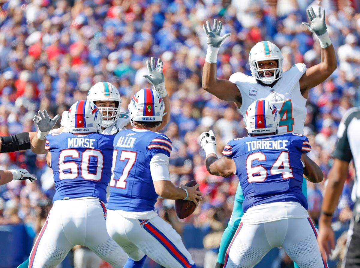 Buffalo Bills quarterback Josh Allen (17) looks to pass as the Miami Dolphins defend in the first half at Highmark Stadium in Orchard Park, NY., on Sunday, October 1, 2023.