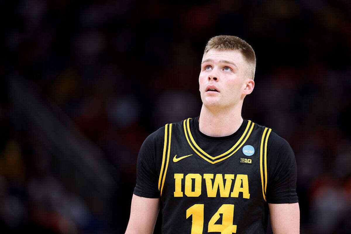 Bennett Stirtz #14 of the Iowa Hawkeyes looks on against the Illinois Fighting Illini during the second half in the Elite Eight of the 2026 NCAA Men's Basketball Tournament at Toyota Center on March 28, 2026 in Houston.