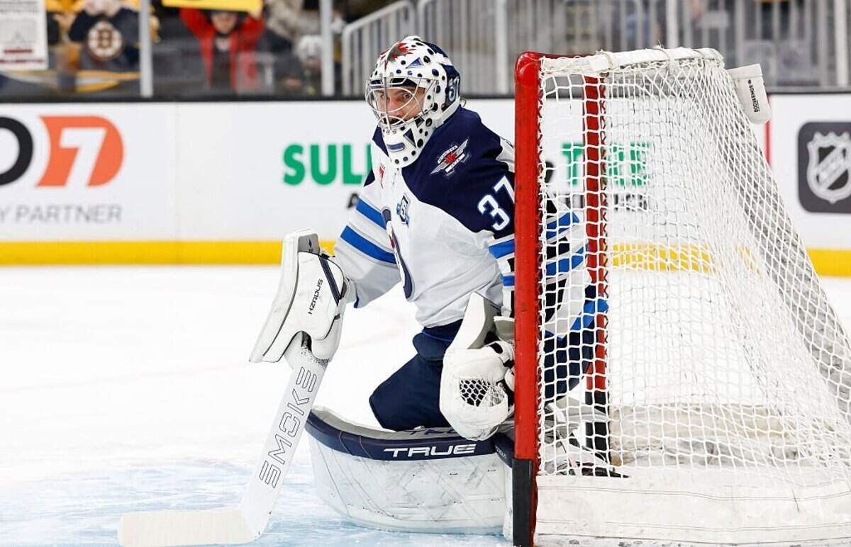 BOSTON, MASSACHUSETTS - MARCH 19: Connor Hellebuyck #37 of the Winnipeg Jets warms up prior to a game against the Boston Bruins at the TD Garden on March 19, 2026 in Boston, Massachusetts. (Photo by Rich Gagnon/Getty Images)