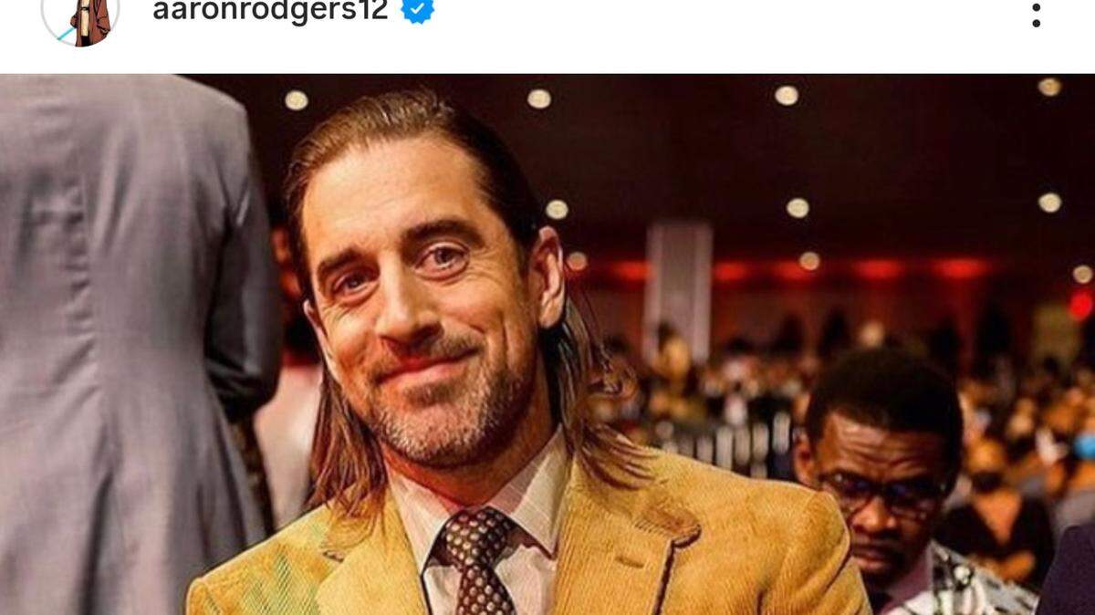 aaron rodgers gold suit