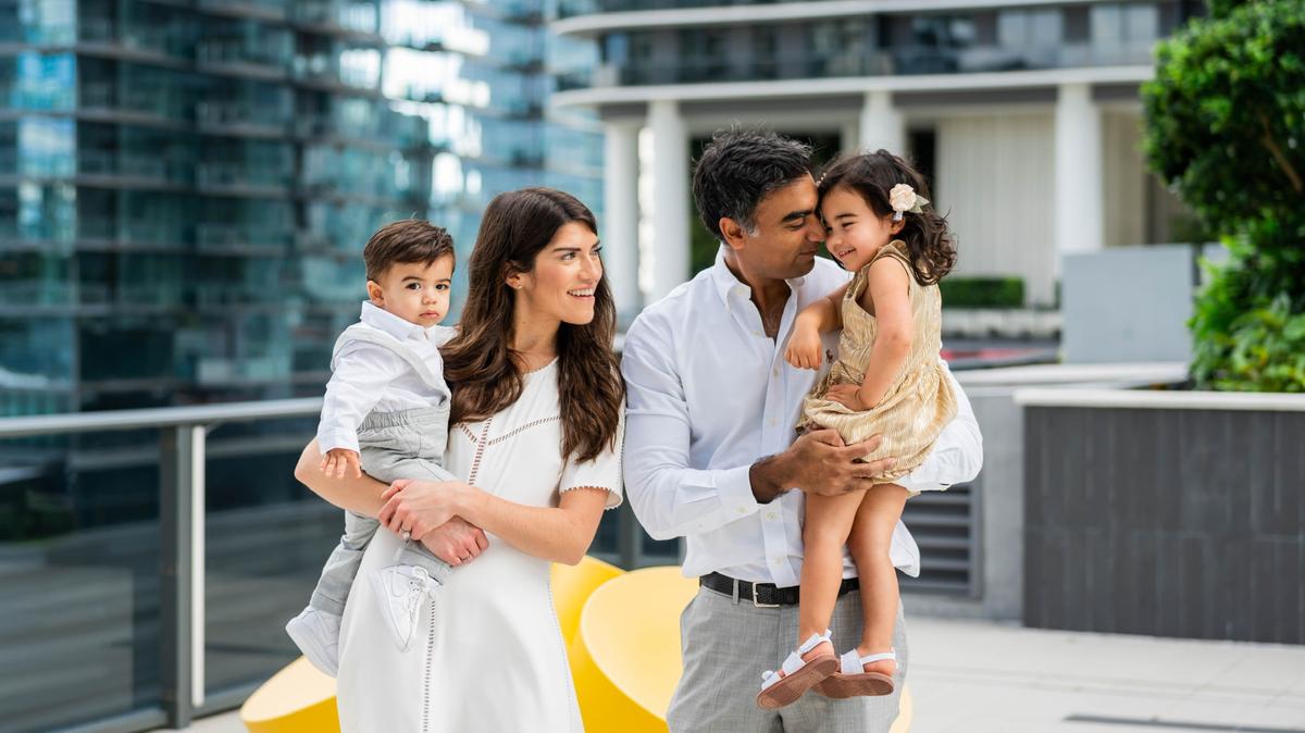 Dr. Katherine Amin, a urologist at the University of Miami Health System, and Dr. Sunil Amin, a UHealth gastroenterologist, with their children, Maya, 2, and Zian, 15 months. Katherine learned she was pregnant with their son when the pandemic began in March 2020.