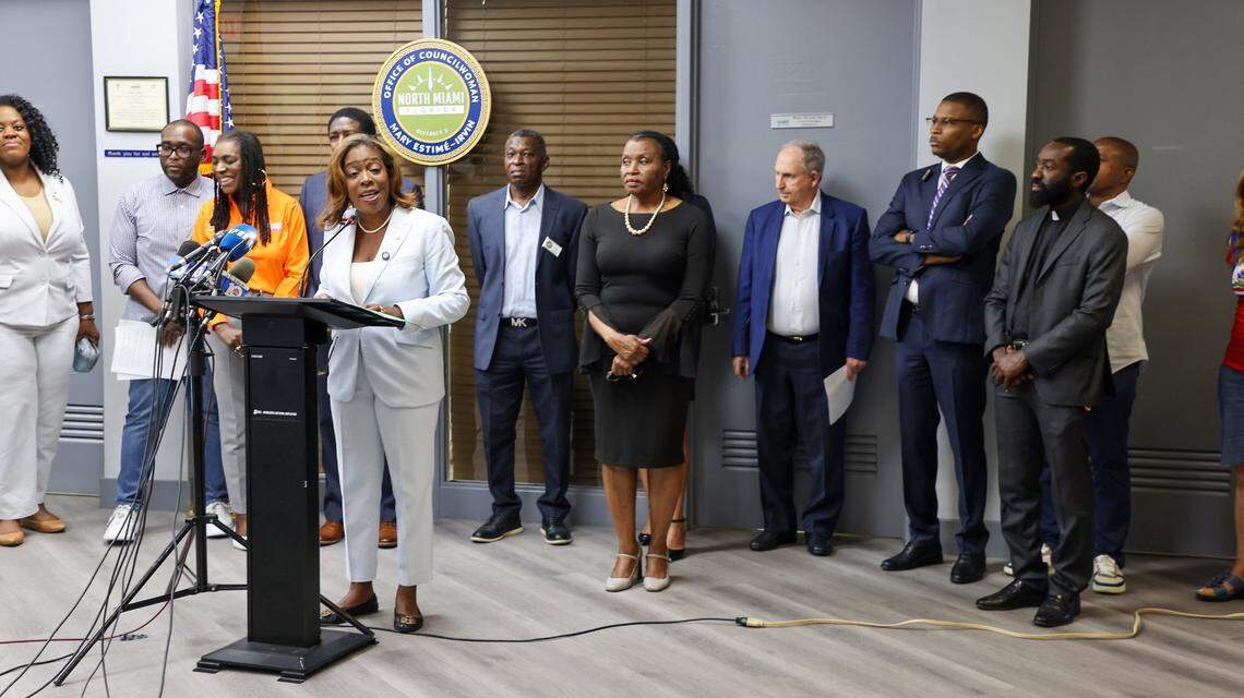 North Miami Councilwoman Mary Monestime-Irvin, center, speaks about the end of TPS for Haitians at a press conference in North Miami.