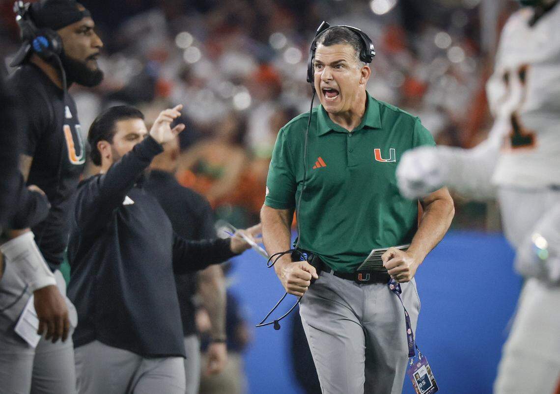 Miami Hurricanes head coach Mario Cristobal reacts after a play during the first half of a College Football Playoff semifinal against the Mississippi Rebels in the Fiesta Bowl at State Farm Stadium on Thursday, January 8, 2026 in Glendale, Arizona.