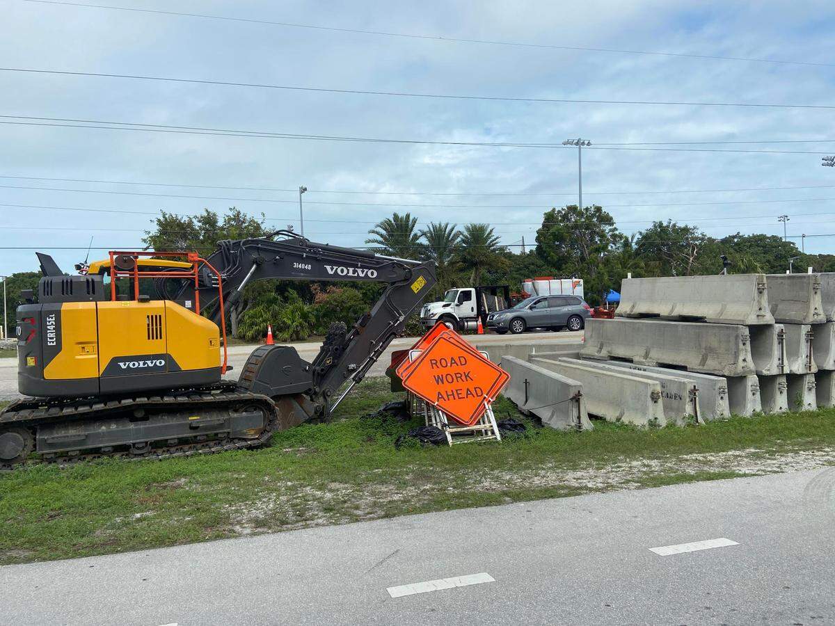 Construction equipment is gathered at a staging area along U.S. 1 at mile marker 87 in Islamorada. The equipment was for a $4.7 million pedestrian bridge to be built above the highway to connect to Founders Park. State transportation officials announced Feb. 5, 2021, that it was scrapping the project.