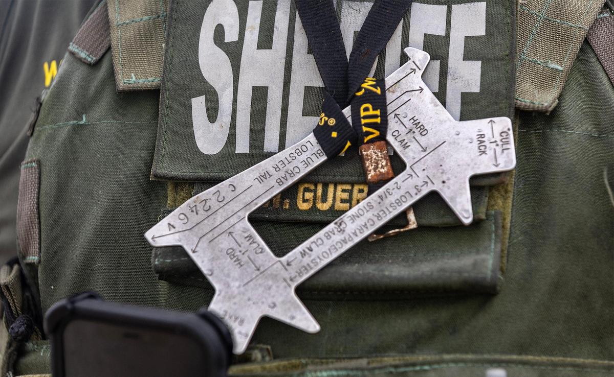 View of a crab and lobster gauge used by Monroe County Sheriff’s Office Marine Deputy Willie Guerra during the first day of lobster mini season in the Florida Keys on Wednesday, July 26, 2023.
