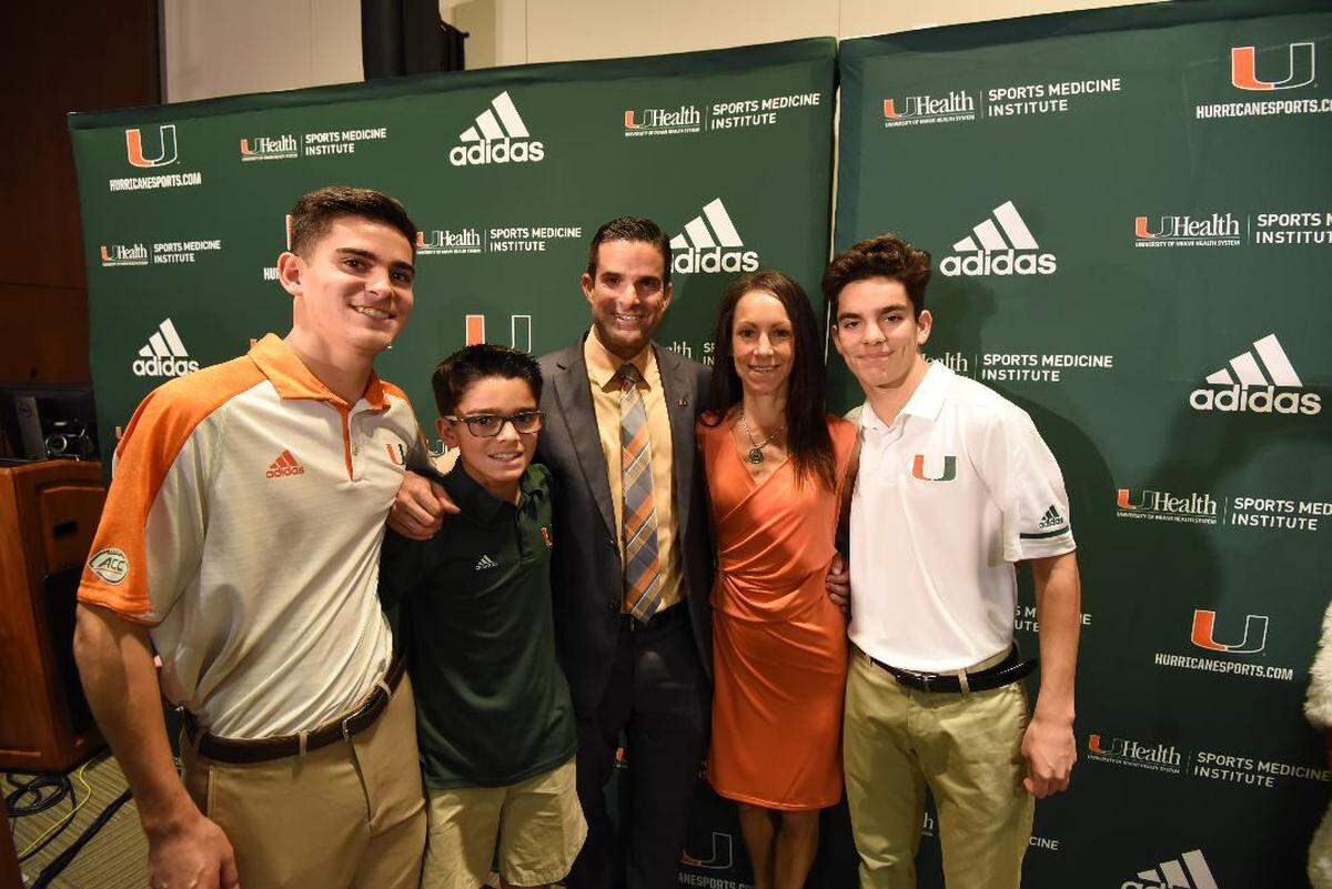 University of Miami football coach Manny Diaz with his wife, Stephanie, and sons (from left) Colin, “Little Manny”, Gavin.