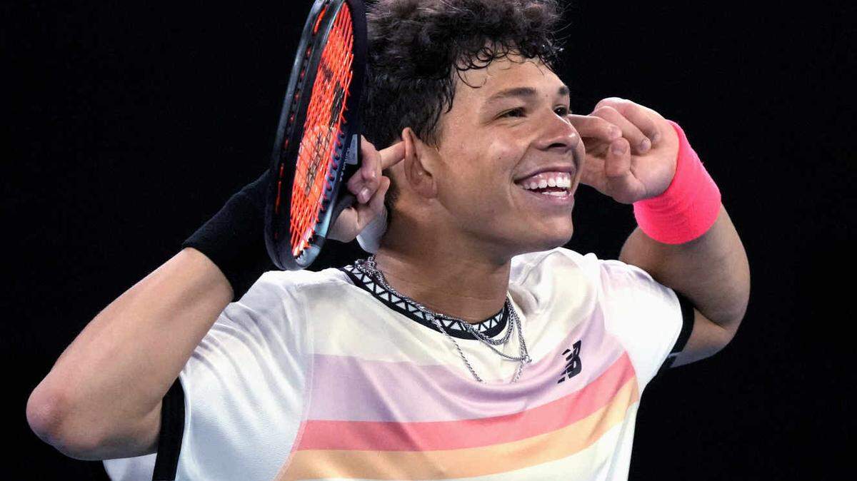 Ben Shelton of the U.S. celebrates after defeating Alexei Popyrin of Australia in their third round match at the Australian Open tennis championship in Melbourne, Australia, Saturday, Jan. 21, 2023. (AP Photo/Dita Alangkara)