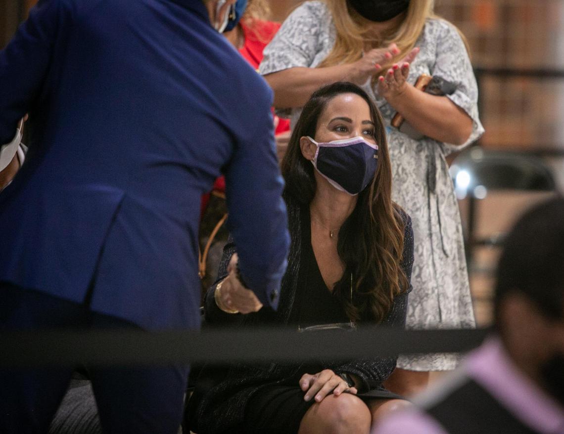 Danielle Cohen Higgins, the newly appointed Miami-Dade County commissioner for District 8, is congratulated by supporters in the lobby of the Stephen Clark Government Center on Monday, Dec. 7, 2020, after the Miami-Dade County Commission appointed her to fill the seat vacated by Daniella Levine Cava, who was elected county mayor on Nov. 3.