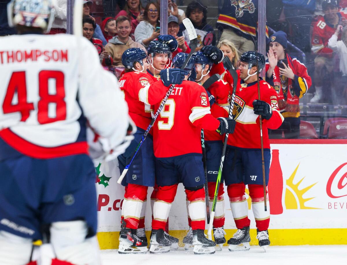 Florida Panthers defenseman Niko Mikkola (77) celebrates his first goal of the season with teammates during the first period of a game on Monday, Nov. 25, 2024, at Amerant Bank Arena in Sunrise, Fla.