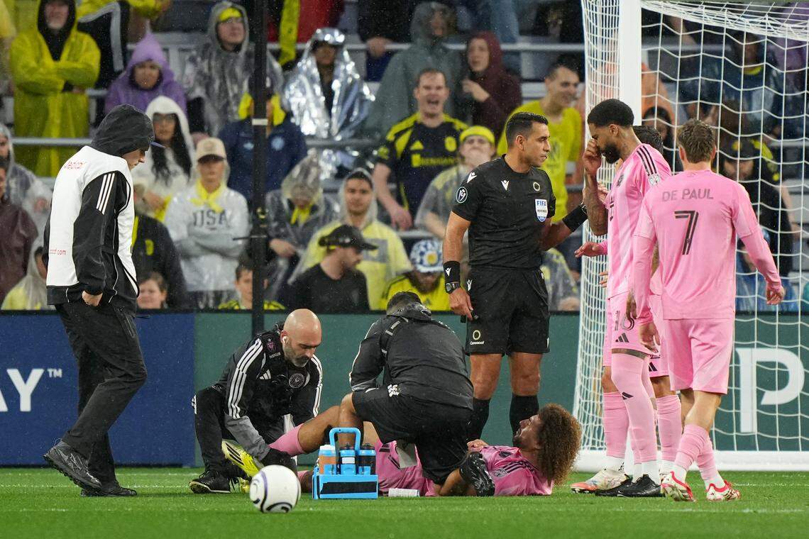 NASHVILLE, TENNESSEE - MARCH 11: Maximiliano Falcón #37 of Inter Miami CF receives medical attention during the CONCACAF Champions Cup 2026 match between Nashville SC and Inter Miami CF at GEODIS Park on March 11, 2026 in Nashville, Tennessee.  (Photo by Chris Carter/Getty Images)