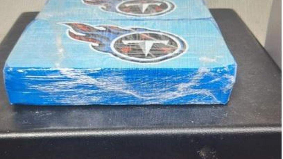 Two kilograms of fentanyl are placed on a scale. The drugs were shipped from Mexico to California, and then to Florida via the U.S. Postal Service, according to federal court records.