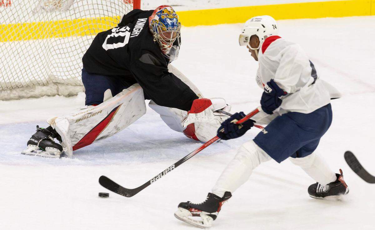 Florida Panthers goaltender Spencer Knight (30) and forward Justin Sourdif (24) run drills during training camp at the Baptist Health IcePlex on Thursday, Sept. 19, 2024, in Fort Lauderdale, Fla.