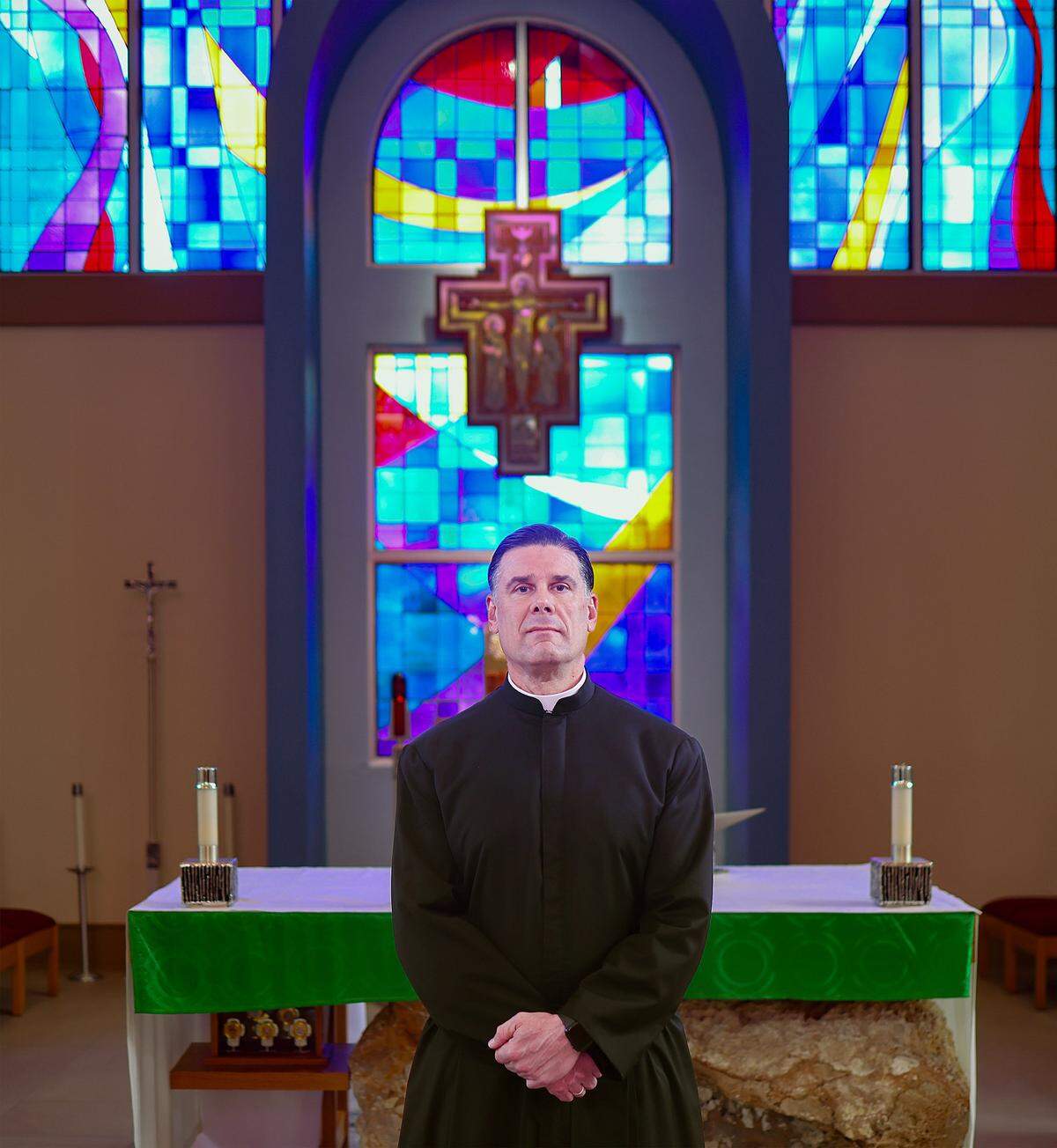 Father Rafael Capó, vice president of mission and ministry and dean of Theology at St. Thomas University, talks about the risks and responsibilities that come with embracing new technologies like AI in ministry. As a digital influencer in the Catholic church, Capó has dealt with scammers creating hundreds of fake profiles of himself over the years that were sent to his followers. Father Rafael Capó, is photographed inside St. Anthony Chapel at St. Thomas University in Miami Gardens, Florida, on February 17, 2026.