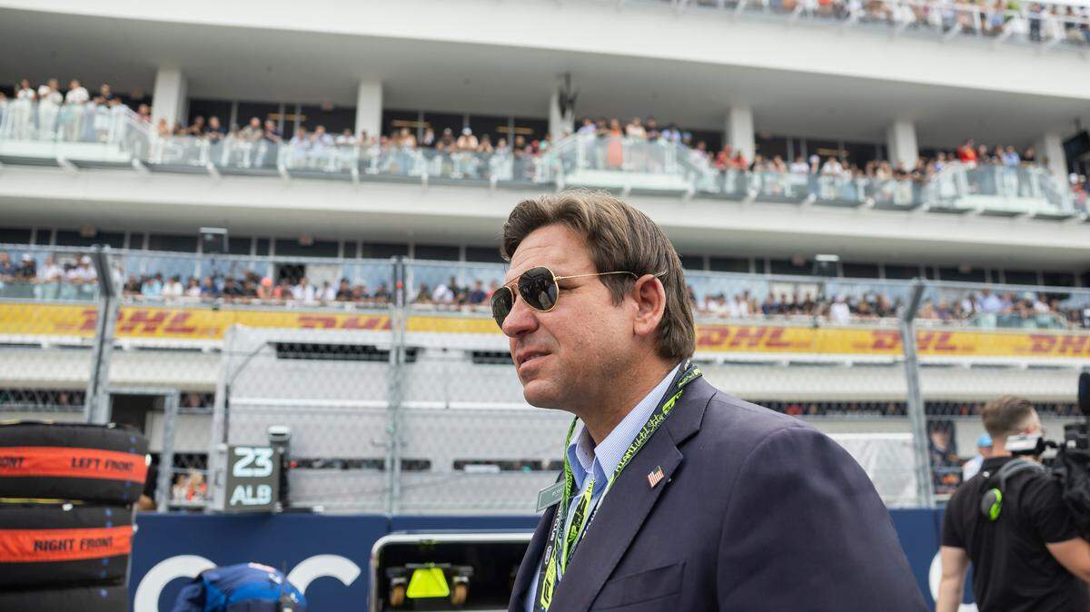 Florida Governor Ron DeSantis walks the grid ahead of the Formula One Miami Grand Prix at the Miami International Autodrome on Sunday, May 4, 2025, in Miami Gardens, Fla.