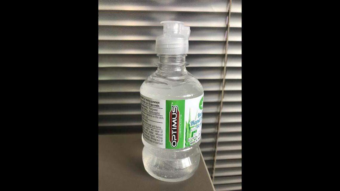 An Optimus hand sanitizer 8.5-ounce bottle