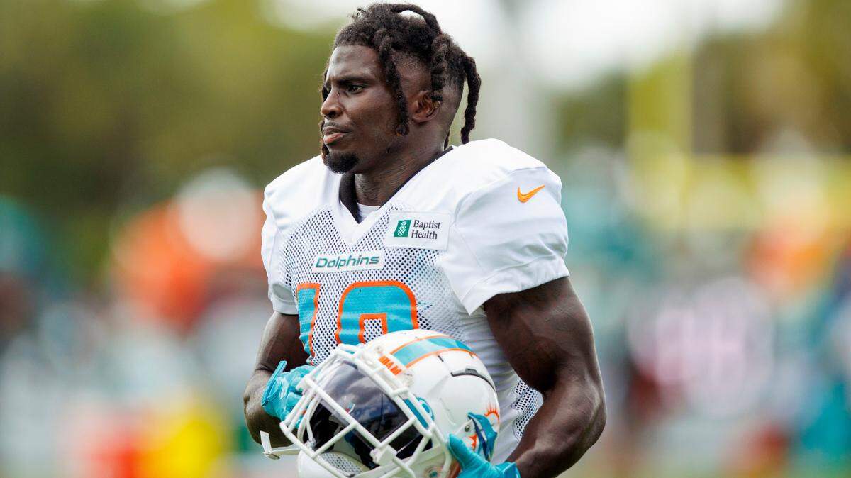 Miami Dolphins wide receiver Tyreek Hill (10) looks on during NFL football training camp at Baptist Health Training Complex in Hard Rock Stadium on Sunday, August 7, 2022 in Miami Gardens, Florida.