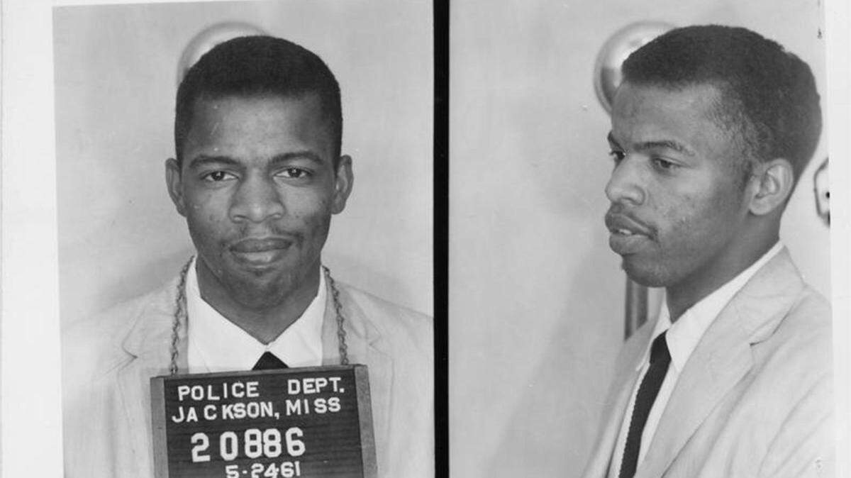 In 2014, Rep. John Lewis tweeted his booking photo — taken when he was arrested in Mississippi for protesting Jim Crow laws — to mark the day that he was released from prison 53 years before.