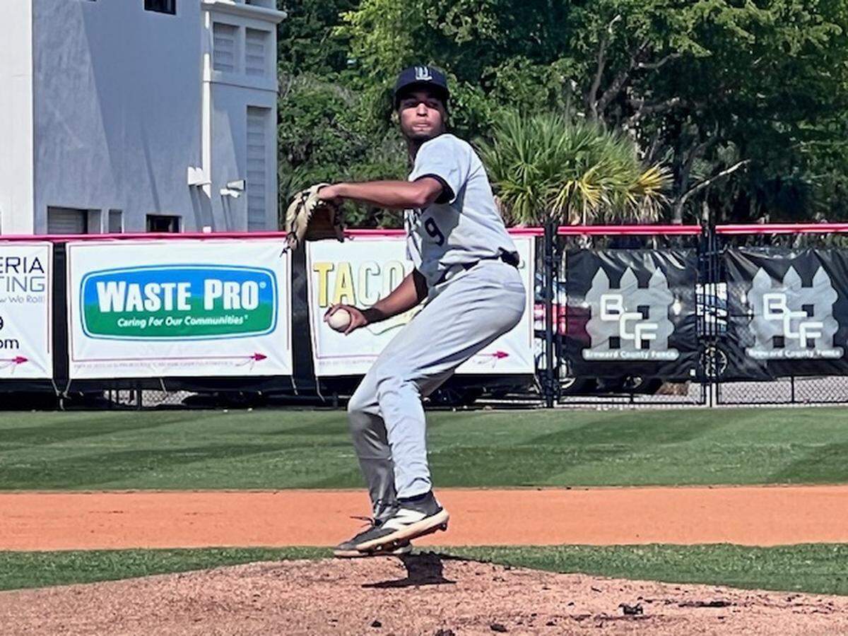 Mater Lakes starting pitcher Alfrin Rosario throws a pitch during Tuesday’s 8-0 loss to host Cardinal Gibbons in the Region 4-4A baseball final.