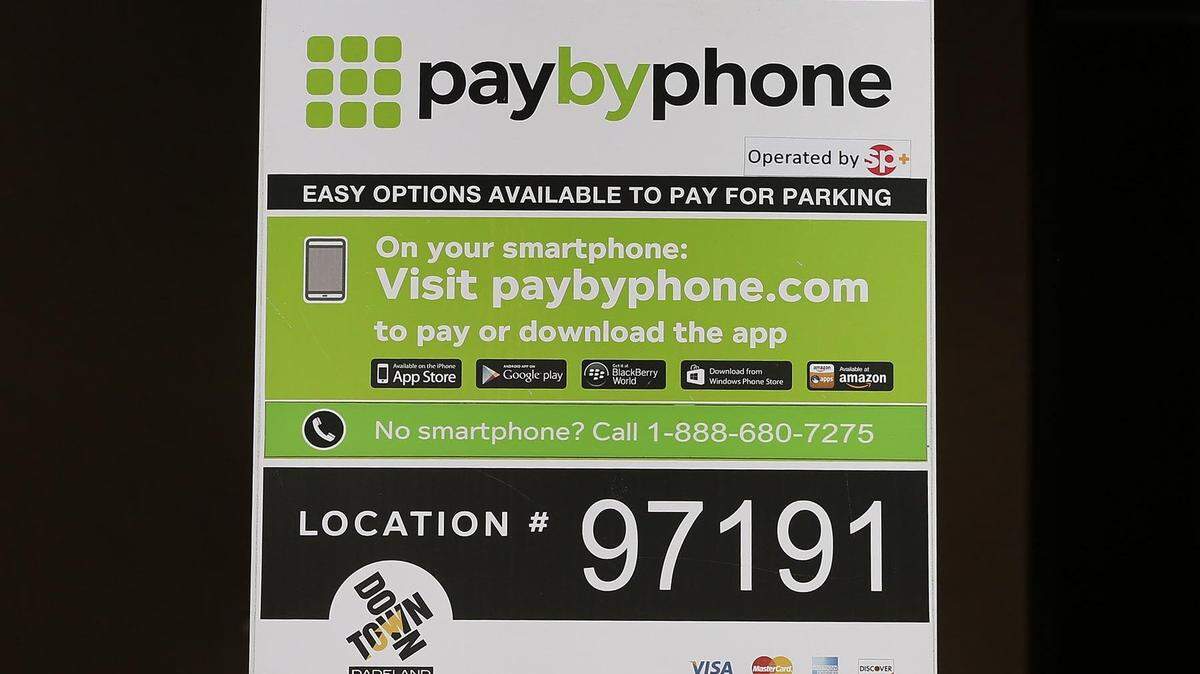 A PayByPhone sign across the street from Dadeland Mall on Saturday, October 21, 2017