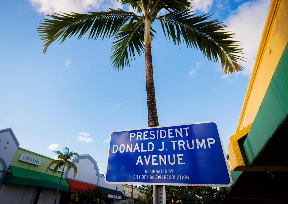 A “President Donald J. Trump Avenue” sign can be seen on Palm Avenue during the day on Monday, Nov. 25, 2024, after its designation in Hialeah.
