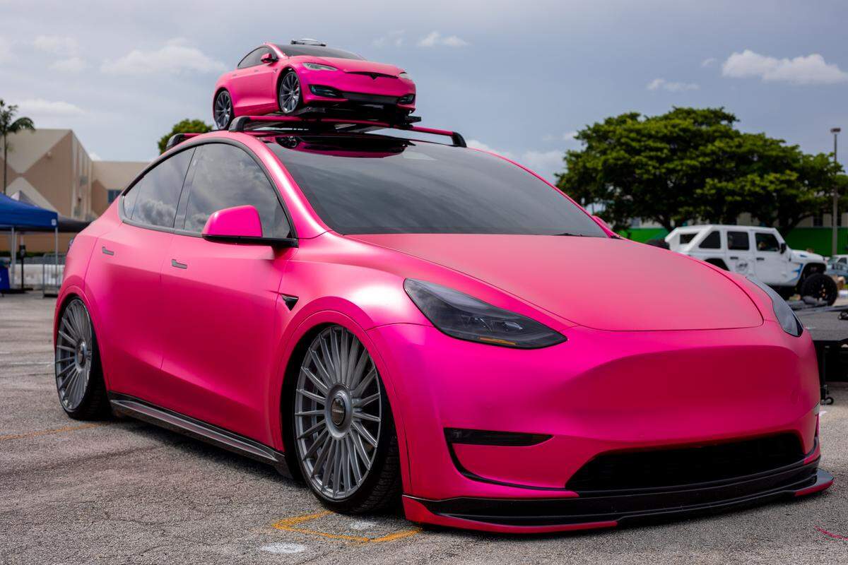A custom hot pink Tesla.