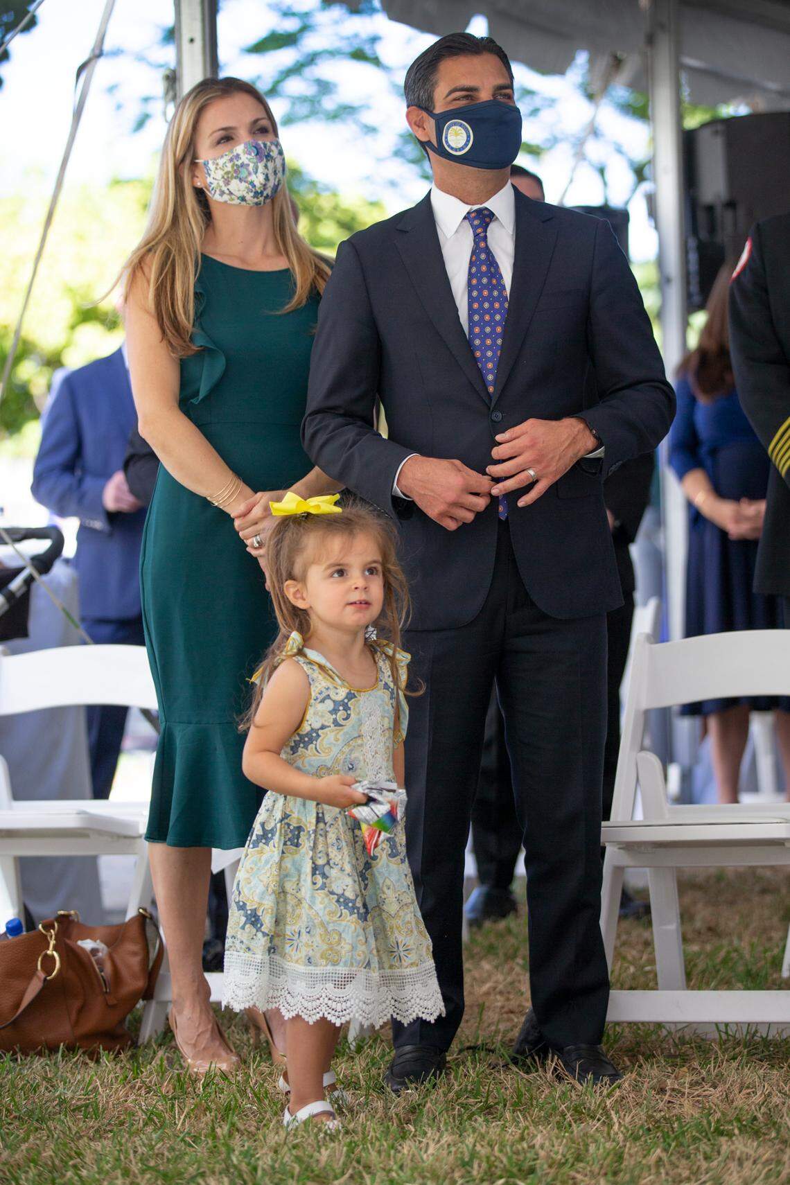 City of Miami Mayor Francis X. Suarez stands with his wife Gloria Fonts Suarez and daughter Gloriana Suarez, 2, after delivering his State of the City Address at Smathers Plaza in Miami in January 2021.