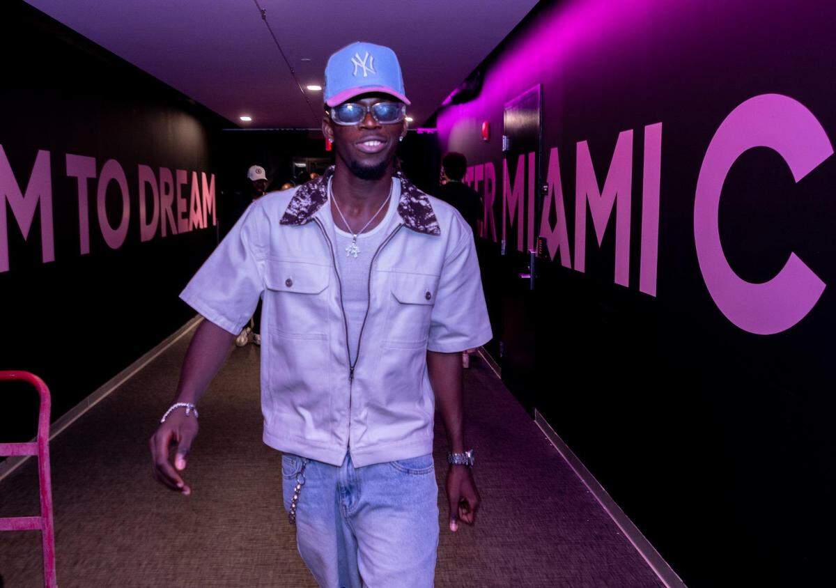 Woodensky Pierre, midfielder of the Haitian national team, walks through a tunnel after arriving in Fort Lauderdale on Tuesday, June 2, 2026, in time to see the team rout New Zealand, 4-0, in a pre-World Cup friendly game. Pierre’s U.S. arrival had been delayed because of issues in securing a visa.