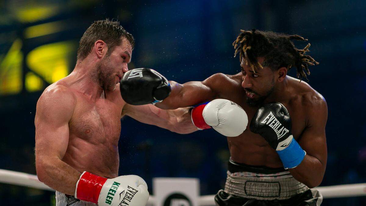 Demetrius Andrade, right, throws a punch against Luke Keeler during their boxing match in the Meridian at Island Gardens in Miami, Florida on Thursday, January 30, 2020.
