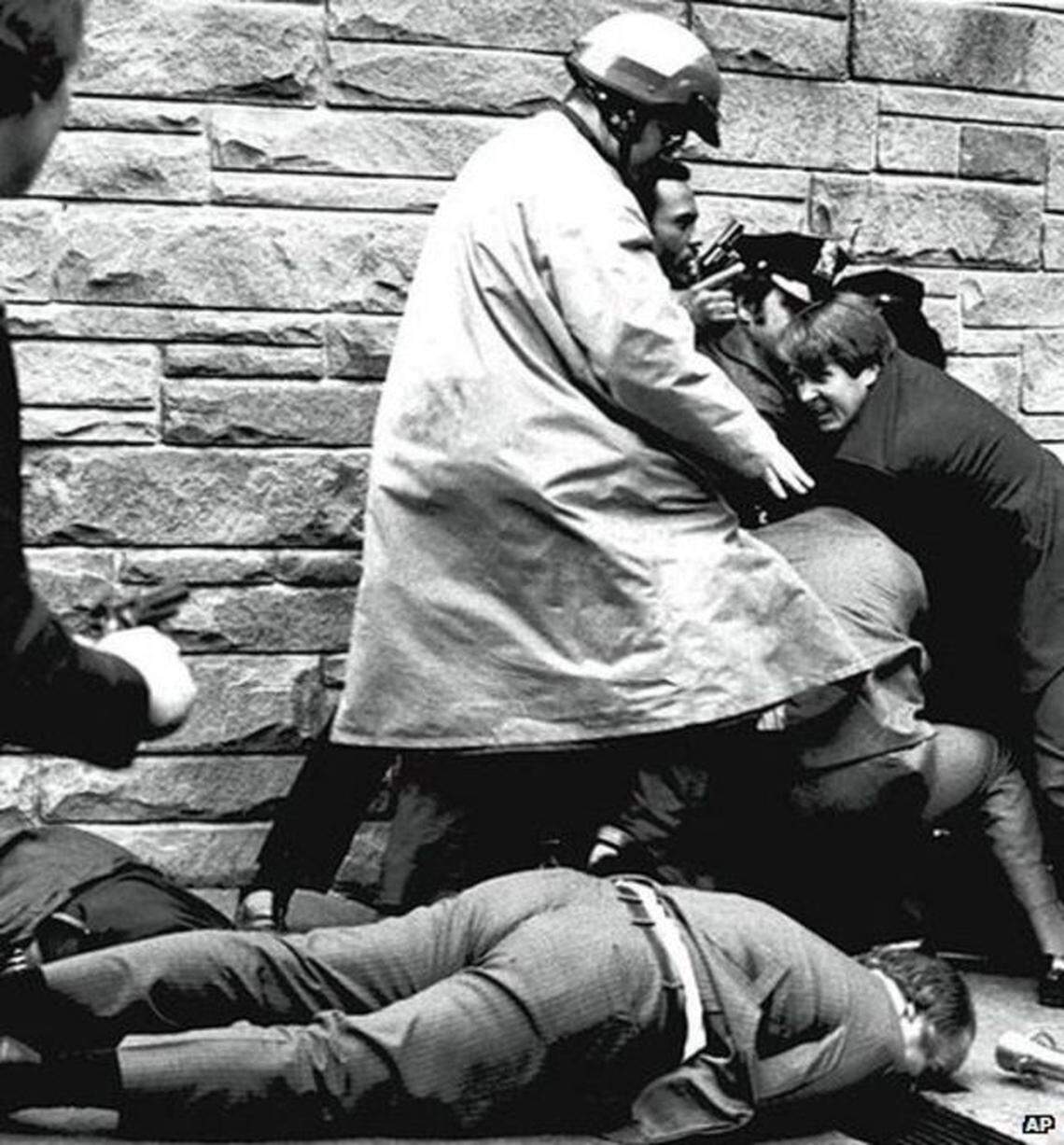 James Brady, President Ronald Reagan’s press secretary, lies gravely wounded in 1981 outside a Washington, D.C., hotel, after a gunman opened fire on the president, who himself was wounded.