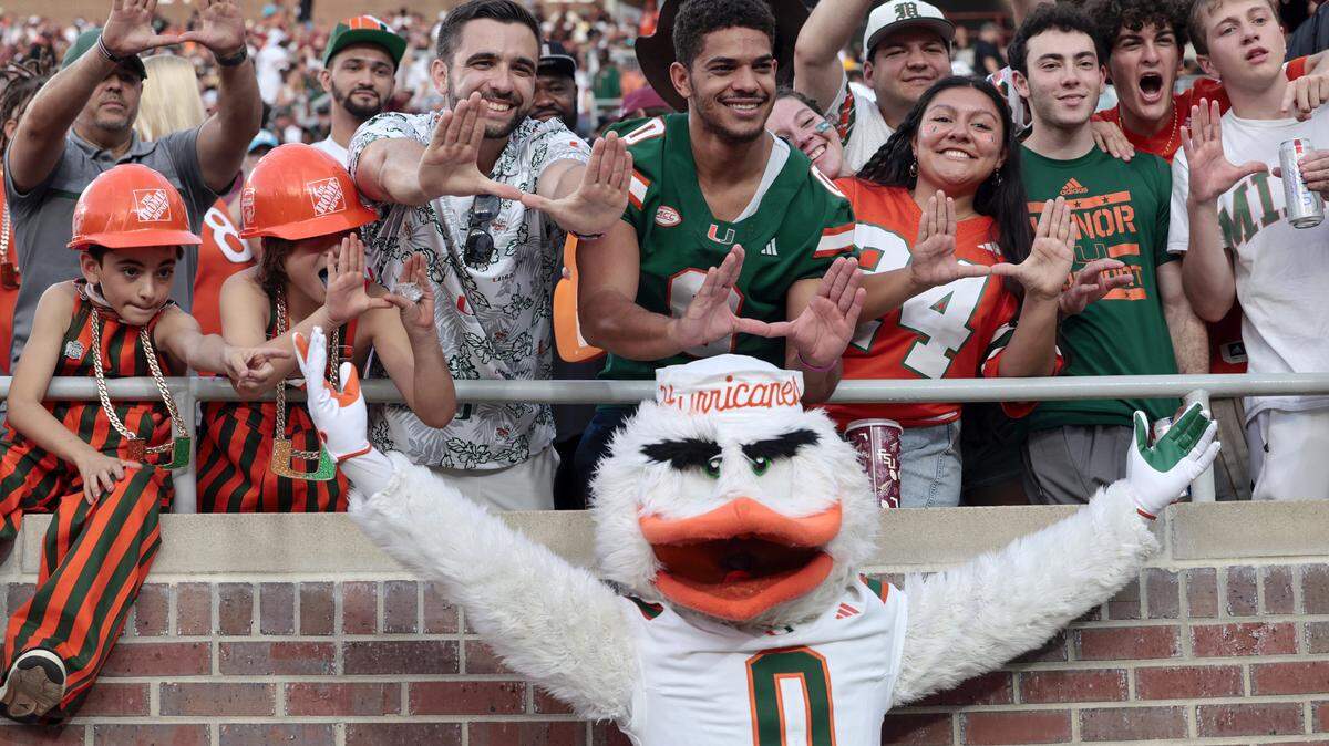 Miami Hurricanes fans and Sebastian the Ibis show their support before the start of the game against the Florida State Seminoles at Doak Campbell Stadium in Tallahassee, Florida, on Saturday, October 4, 2025.