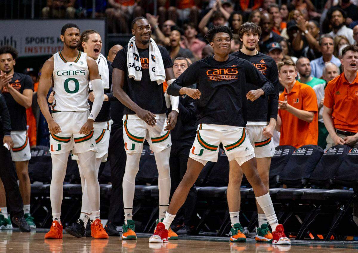 The University of Miami bench reacts to a play during an NCAA basketball game against Pittsburgh University at Watsco Center in Coral Gables, Florida, on Saturday, March 4, 2023.