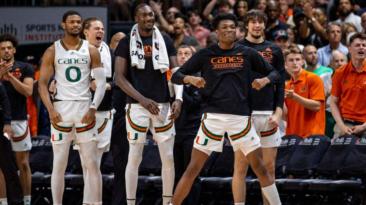 The University of Miami bench reacts to a play during an NCAA basketball game against Pittsburgh University at Watsco Center in Coral Gables, Florida, on Saturday, March 4, 2023.