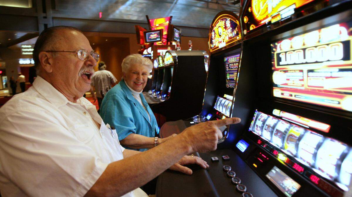 Vito Valentinetti reacts with his wife Mary Ann in May 2009 after a win while playing a slot machine at the Sands Casino Bethlehem in Bethlehem, Pennsylvania. Sands sold that casino to the Poarch Band of Creek Indians of Alabama and North Florida in 2019.