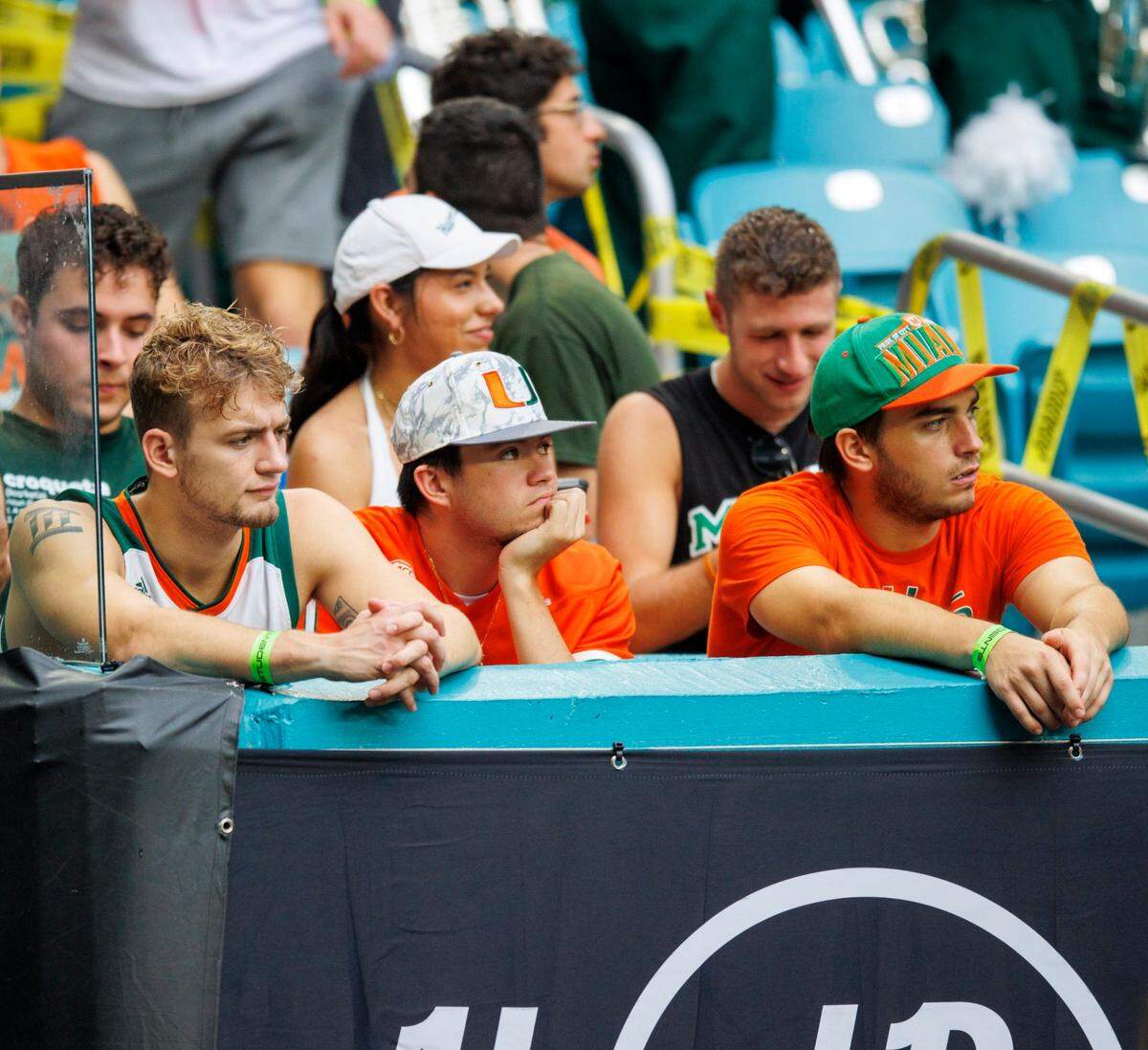 Miami Hurricanes fans look from their seats during the second quarter of an NCAA non conference game against Middle Tennessee State Blue Raiders at Hard Rock Stadium on Saturday, September 24, 2022 in Miami Gardens, Florida.