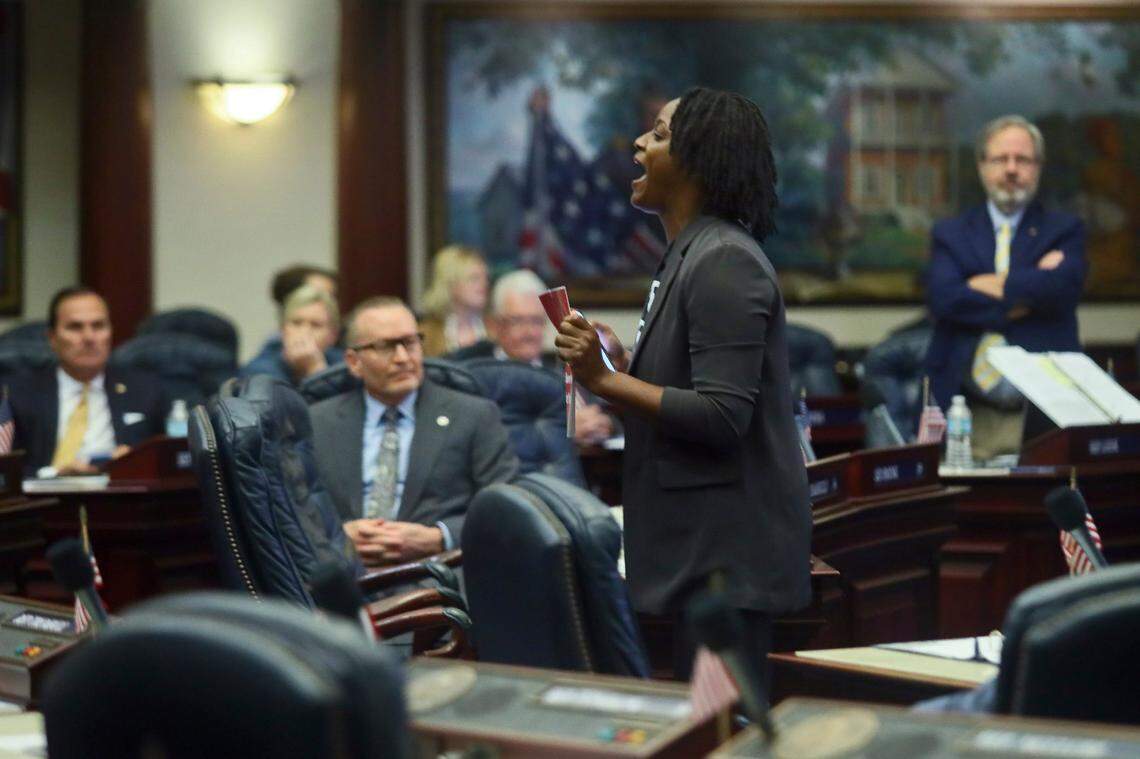 Rep. Angie Nixon, D-Jacksonville breaks up a debate on Senate Bill 2-C: Establishing the Congressional Districts of the State in the House of Representatives Thursday, April 21, 2022 at the Capitol in Tallahassee, Fla. The session was halted by the protest, but resumed an hour later and the bill was passed.