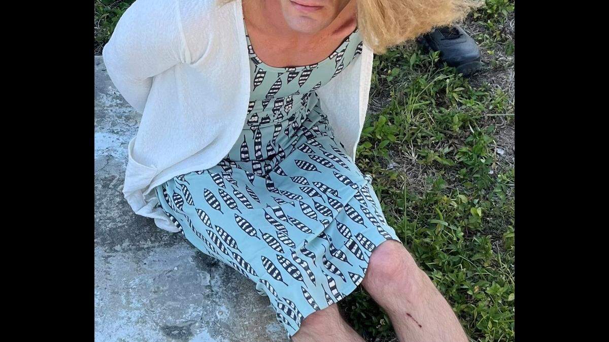 The search for an accused boat thief came to a strange conclusion in Florida when deputies noticed a blonde woman in a blue sundress walking past them bore a striking resemblance to the guy they were hunting.