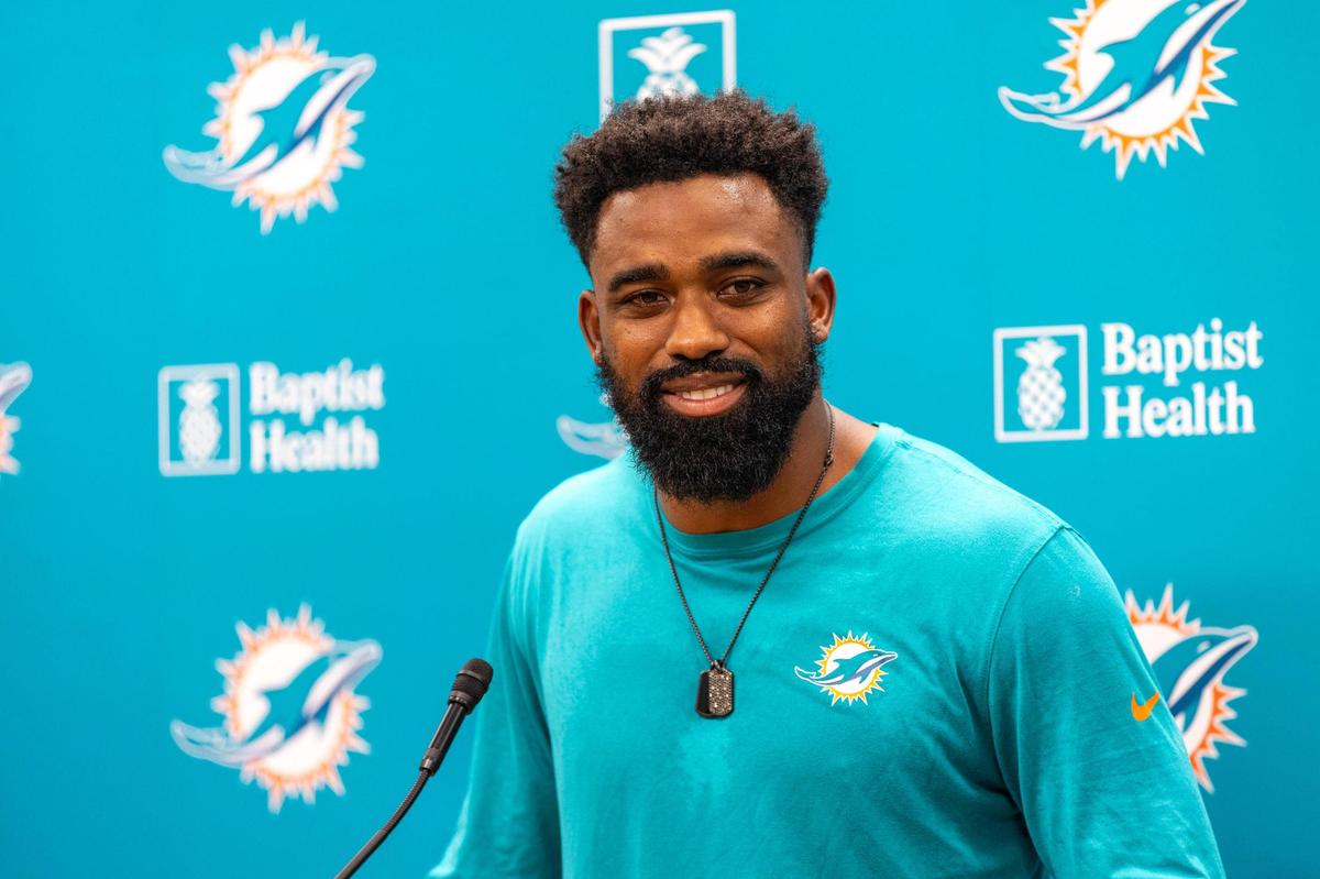 Miami Dolphins running back Raheem Mostert reacts as he speaks to the media during a news conference at the NFL football team’s Baptist Health Training Complex in Miami Gardens, Florida, on Tuesday, July 25, 2023.