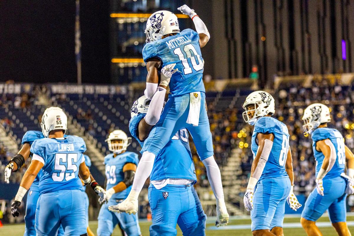 Florida International University wide receiver Kris Mitchell (10) reacts with teammates after scoring a touchdown during the second half of a college football game against North Texas at Riccardo Silva Stadium in Miami, Florida, on Saturday, September 9, 2023.