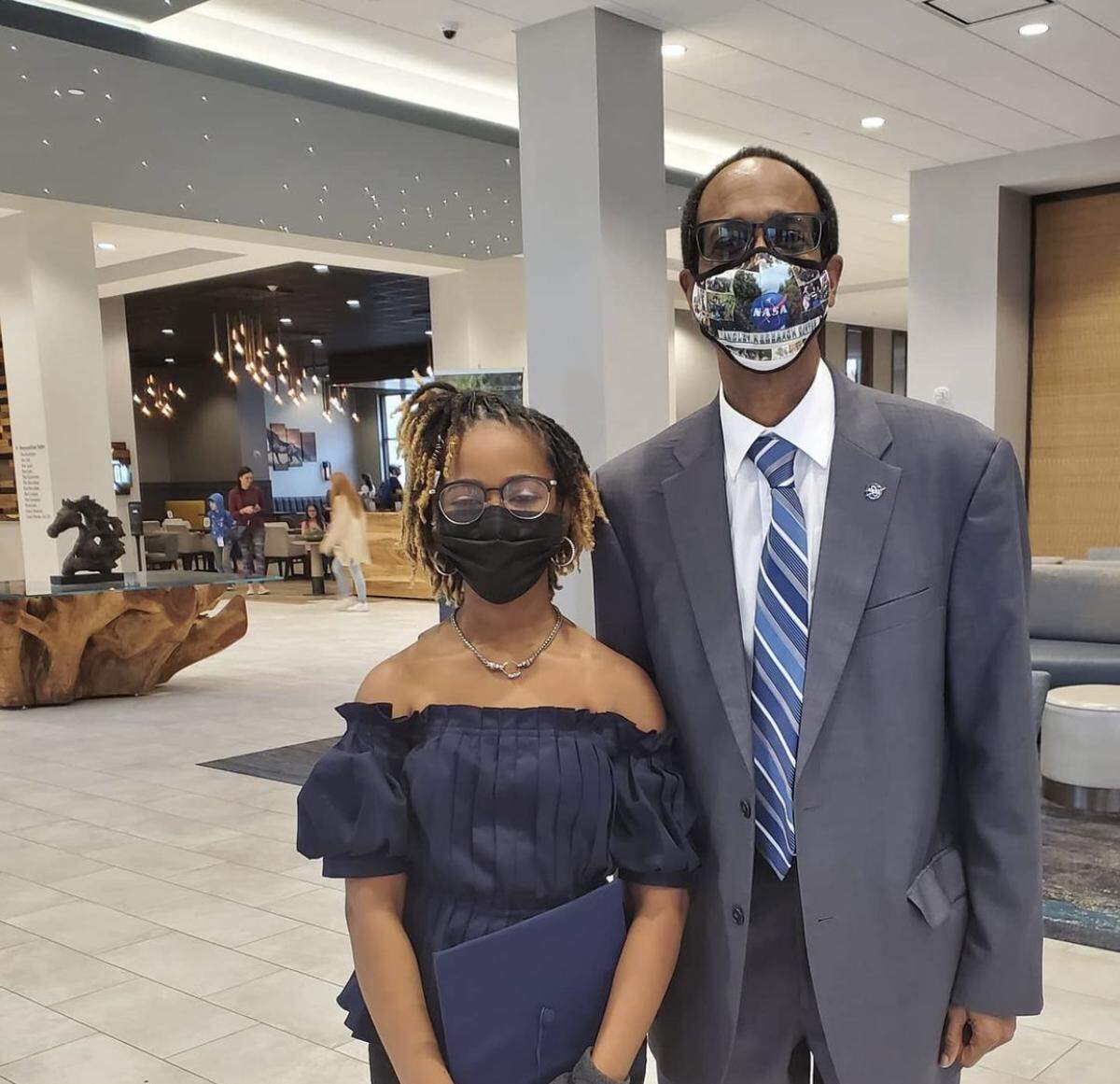 Alena with Clayton Turner, the director NASA’s Langley Research Center. Turner attended Alena’s high school graduation ceremony and became her mentor. MUST CREDIT: Alena Analeigh