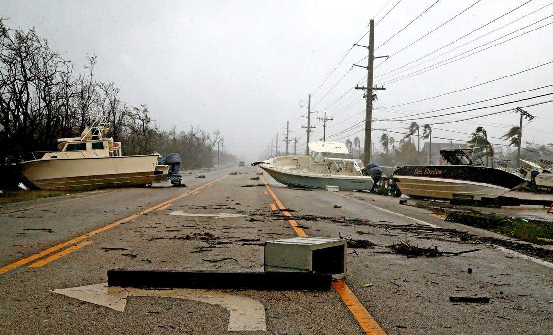 Boats block the Overseas Highway after Hurricane Irma’s surge tossed boats, cars, sheds, appliances and other debris onto the highway throughout the middle Keys on Sept. 10, 2017.